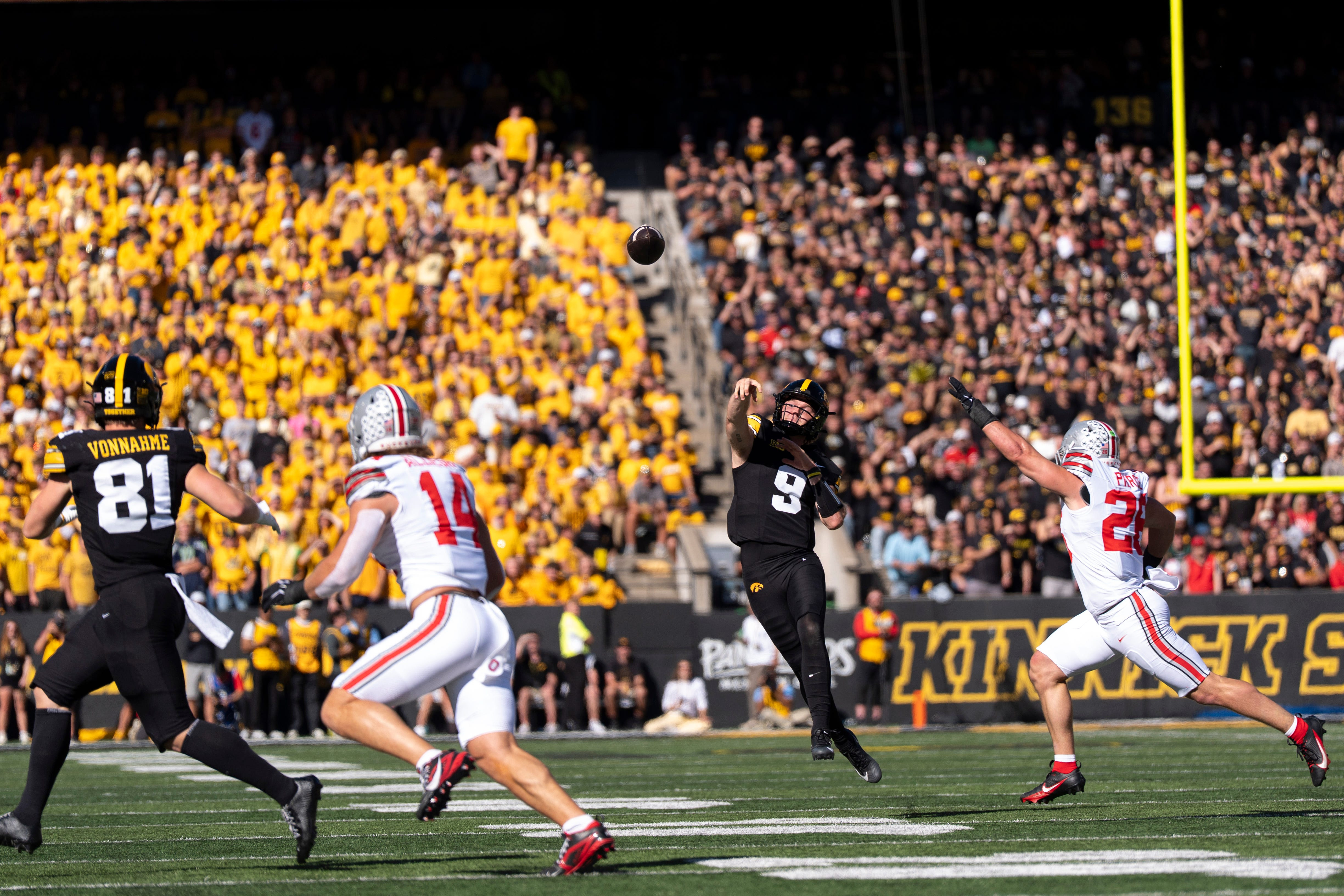 Pictured: Hawkeyes quarterback Hank Brown throwing a pass as we break down our Iowa vs. Washington Prediction. Photo by USA TODAY Network via Reuters Connect.