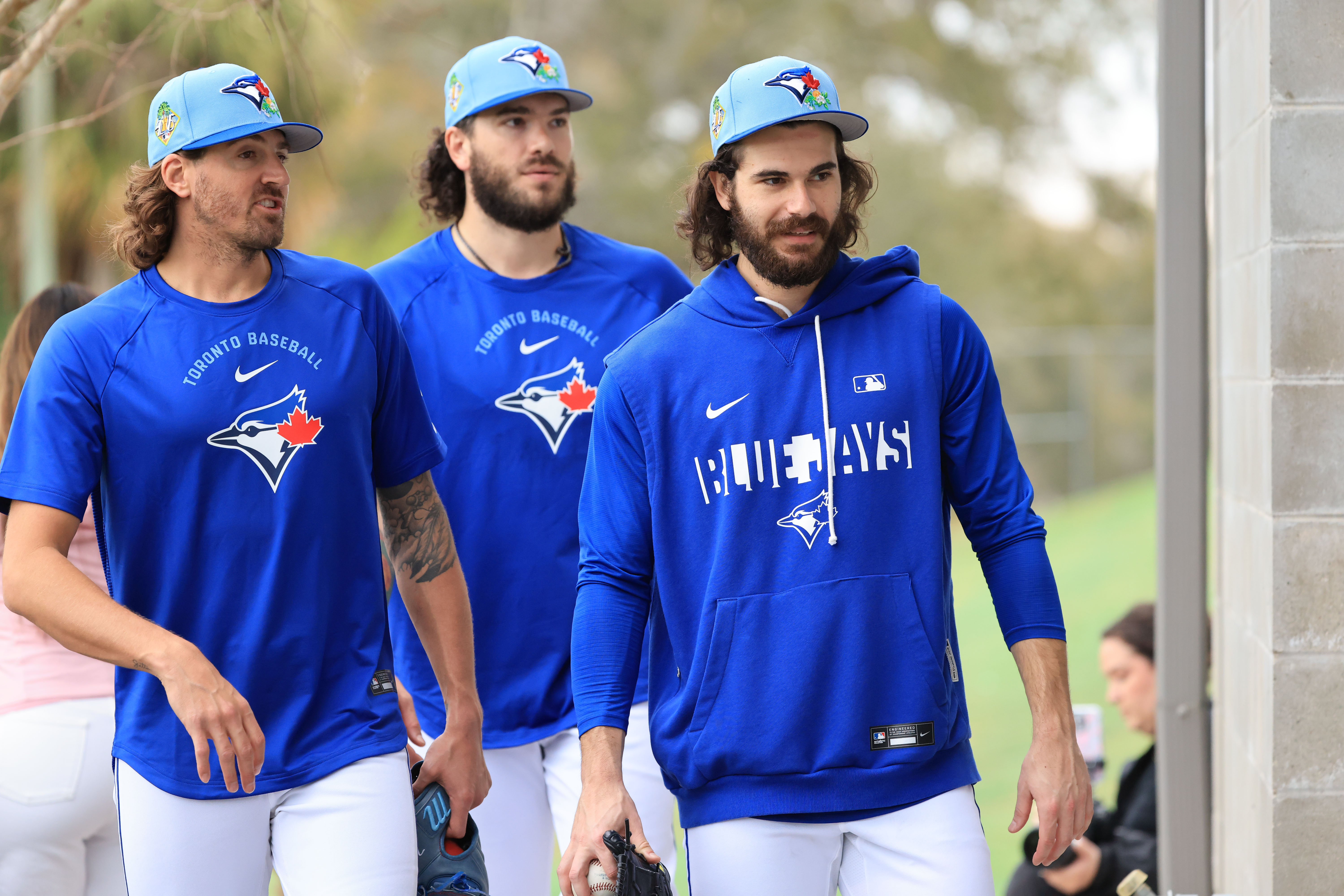 Toronto Blue Jays pitcher Kevin Gausman (34), pitcher Dylan Cease (84), pitcher Cody Ponce (37) workout for spring training practice at Blue Jays Player Development Complex. 