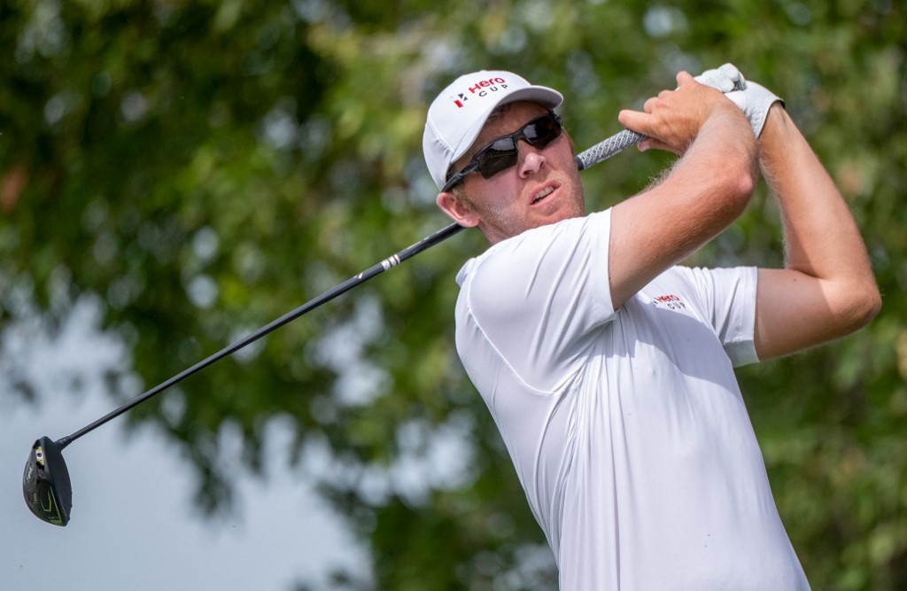 Seamus Power of Team Great Britain and Ireland tees off on the second hole during the first round of the Hero Cup at Abu Dhabi Golf Club in Abu Dhabi, on January 13, 2023. Photo by Ryan Lim via AFP.