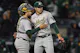 Mason Miller and Shea Langeliers of the Oakland Athletics celebrate a win over the New York Yankees, and we're examining Mason Miller's AL Rookie of the Year eligibility with a look at the best MLB odds.