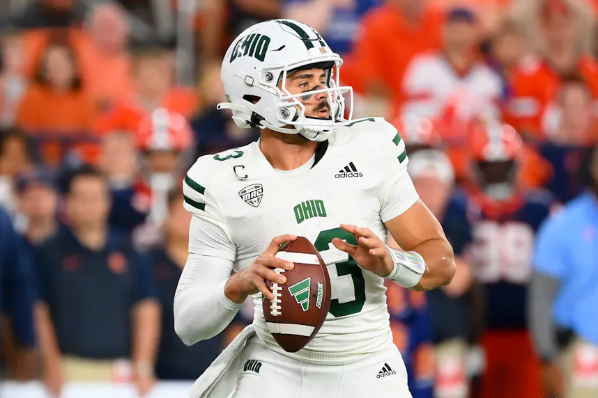 Ohio Bobcats quarterback Parker Navarro drops back to pass against the Syracuse Orange as we look at our Ohio vs. Jacksonville State player prop picks.