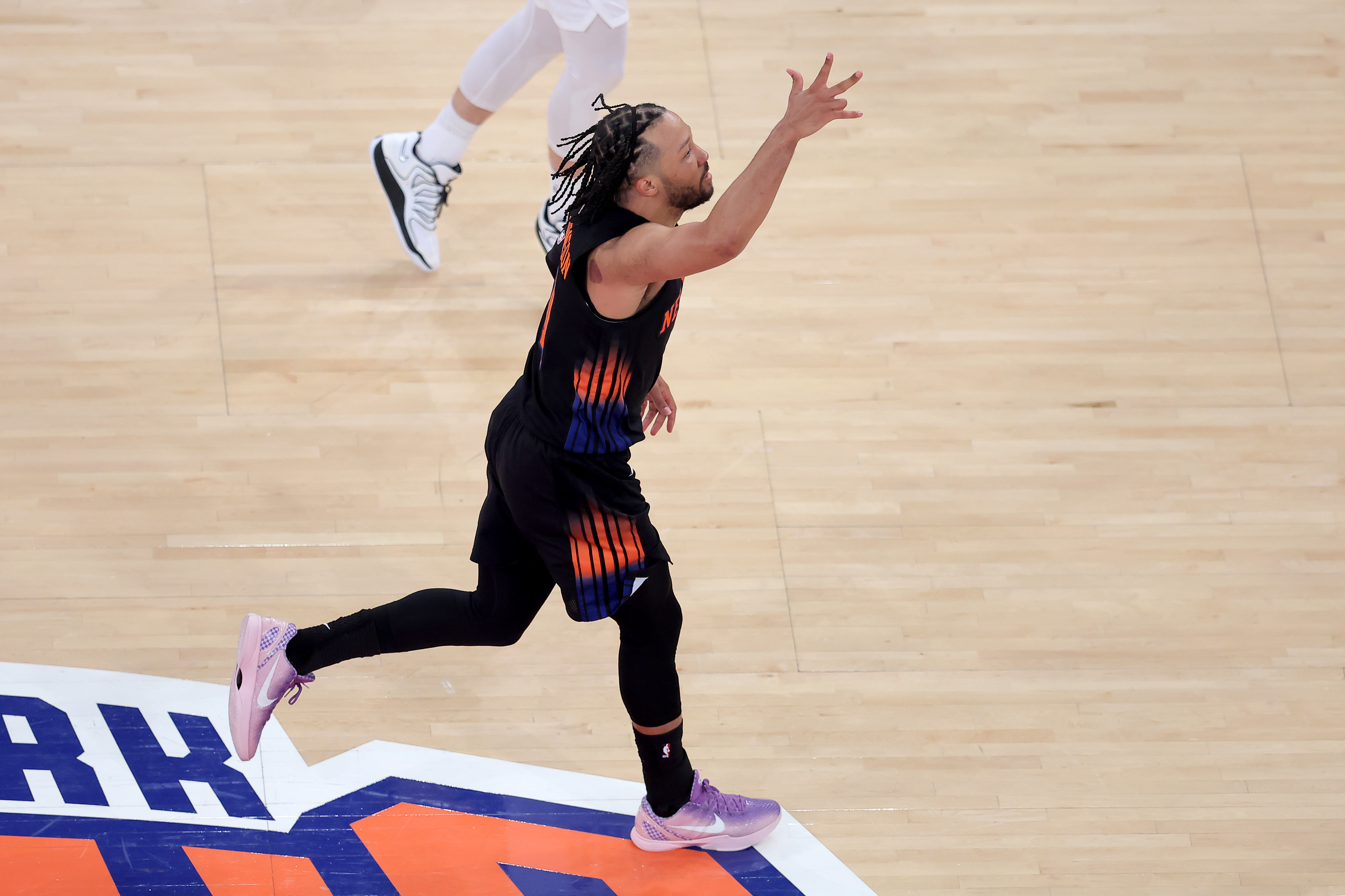 New York Knicks guard Jalen Brunson (11) celebrates his three point shot as he is featured in our best Jalen Brunson player props tonight.
