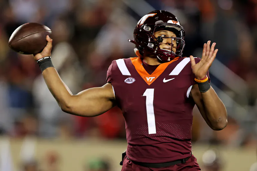 Virginia Tech quarterback Kyron Drones throws a pass against NC State. The Hokies have the most returning production in the country this season.