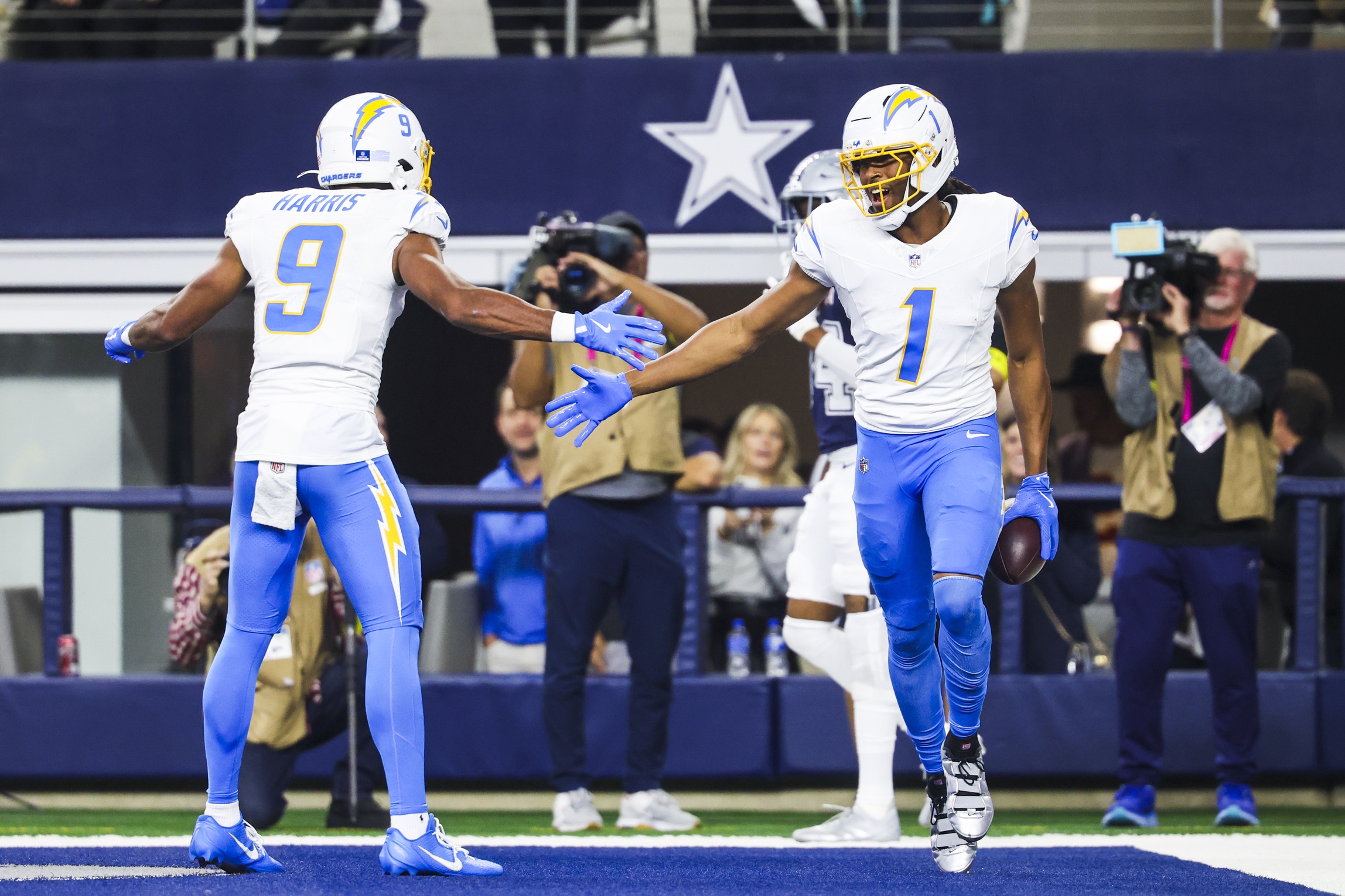 Quentin Johnston celebrates after catching a touchdown pass as we offer our anytime touchdown scorer predictions for Saturday.