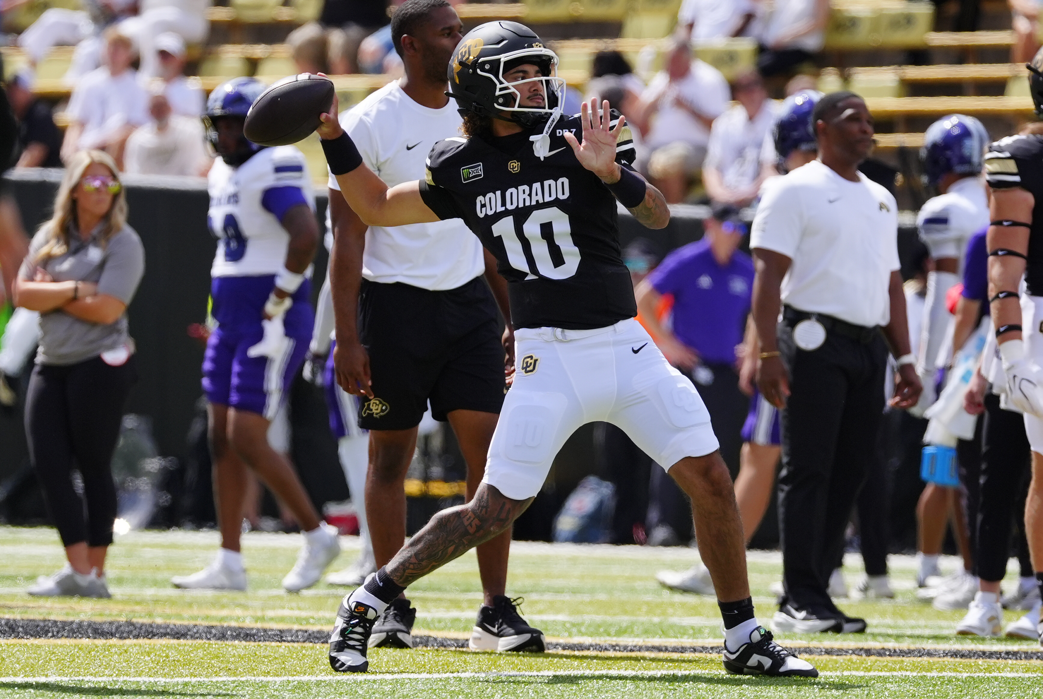 Pictured: Buffaloes quarterback Julian Lewis in action as we break down our Colorado vs. Northwestern Prediction. Photo by Ron Chenoy-Imagn Images.