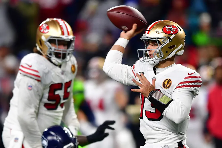 Brock Purdy of the San Francisco 49ers throws a pass as part of our Week 13 NFL predictions for 49ers vs. Chiefs 