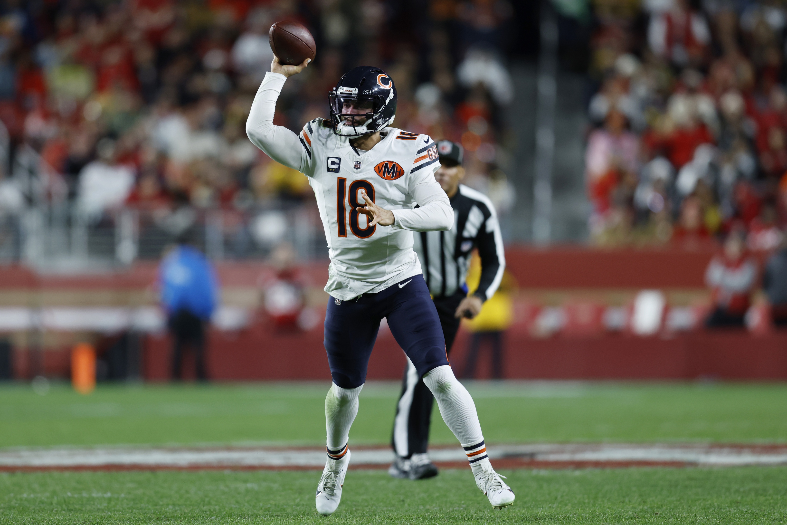 Chicago Bears quarterback Caleb Williams (18) throws a pass as we break down our NFL picks against the spread.