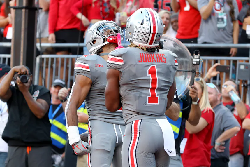Ohio State Buckeyes wide receiver Emeka Egbuka (2) celebrates as we offer our college football Week 7 predictions.
