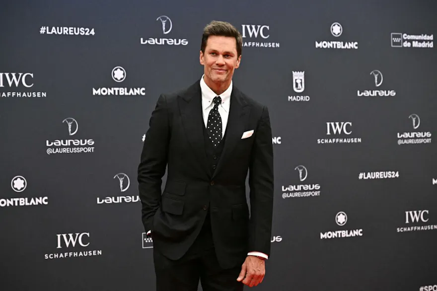 Tom Brady poses on the Red Carpet ahead of the 25th Laureus World Sports Awards gala in Madrid as we look at the Tom Brady roast odds.