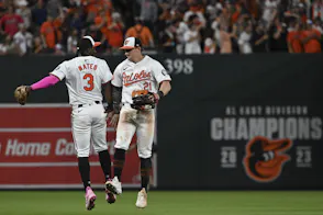 Baltimore Orioles shortstop Jorge Mateo (3) celebrates with outfielder Austin Hays (21) as we examine the Maryland sports betting revenue report for May 2024.
