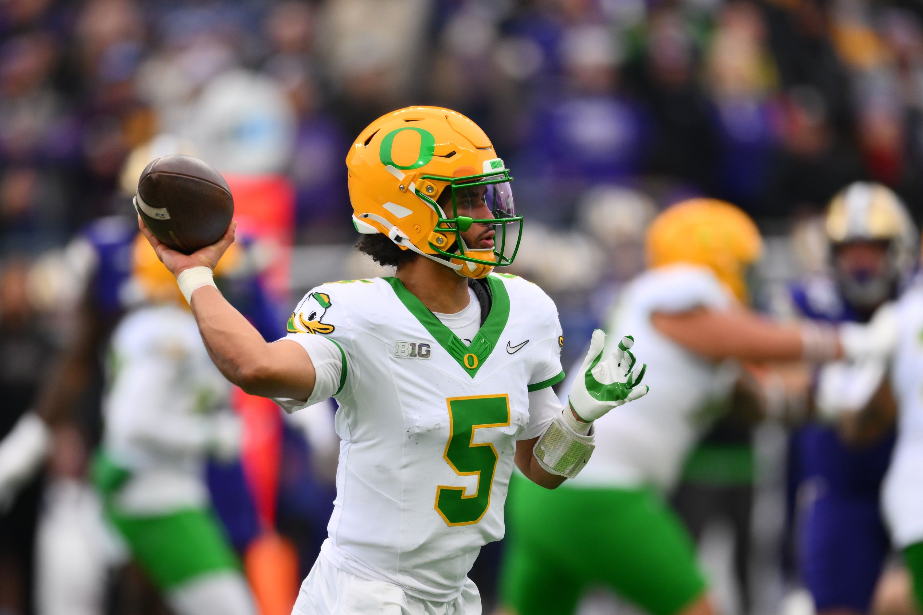 Oregon Ducks quarterback Dante Moore (5) passes the ball as we break down our James Madison vs. Oregon prediction & opening odds.