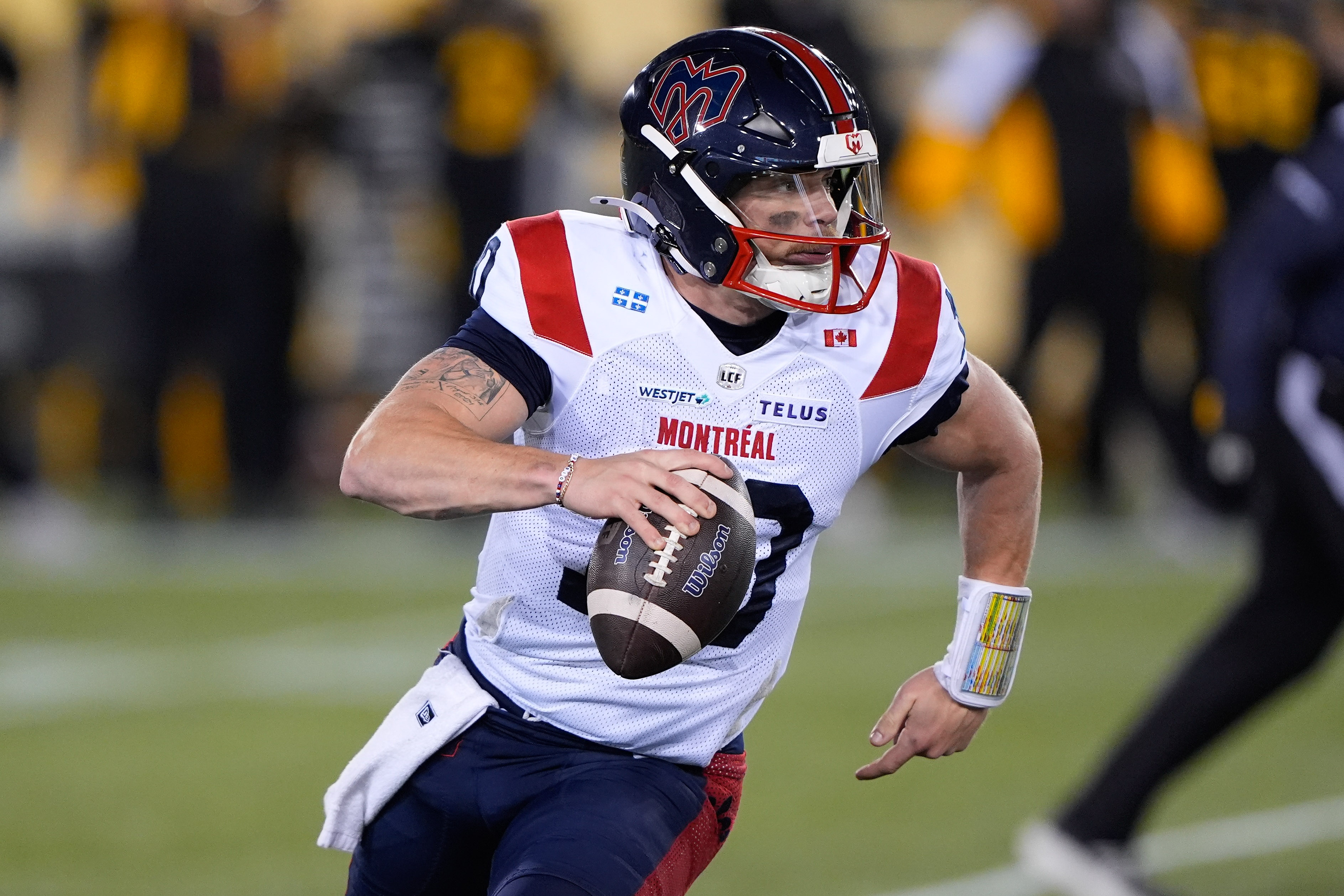 Montreal Alouettes quarterback Davis Alexander (10) rolls out to pass as we break down the 2026 CFL Most Outstanding Player odds.