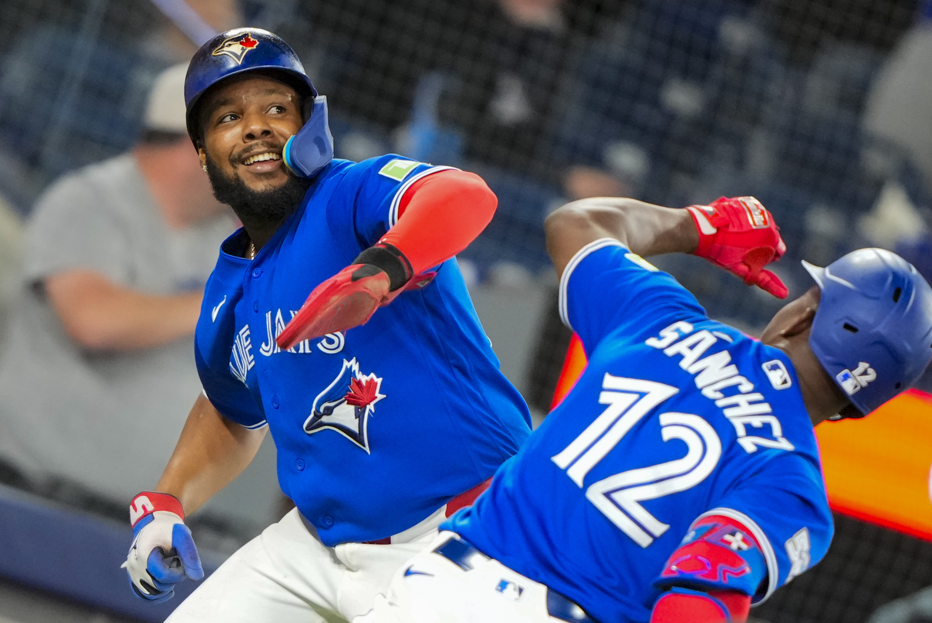 Toronto Blue Jays right fielder Jesús Sánchez celebrates hitting a home run with Vladimir Guerrero Jr. - who's featured in my Red Sox vs. Blue Jays prediction - during the sixth inning at Rogers Centre.
