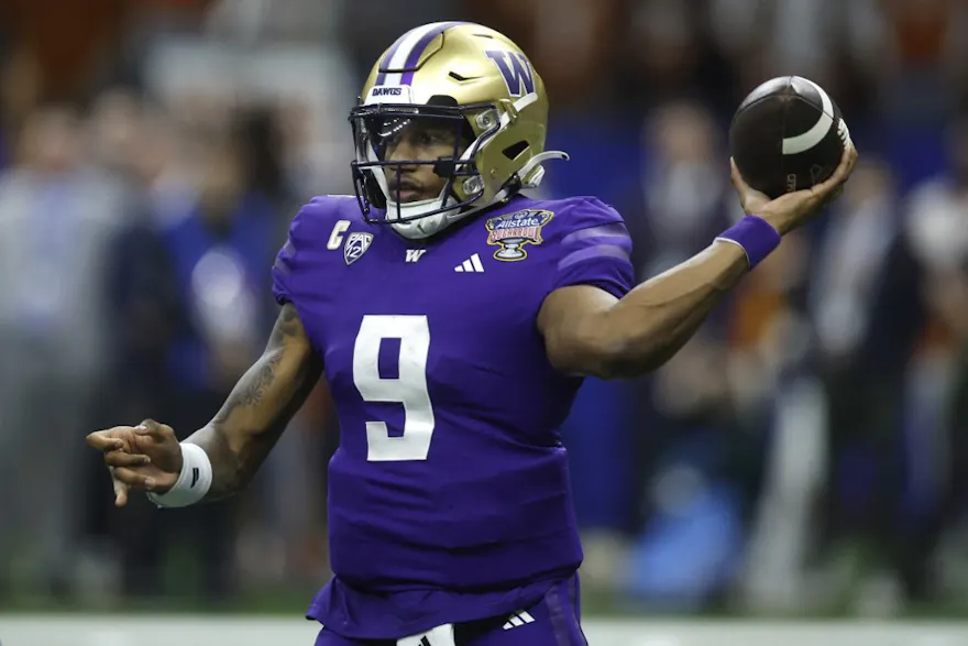 Michael Penix Jr. of the Washington Huskies throws a pass as we share our best Penix player props for the national championship game.