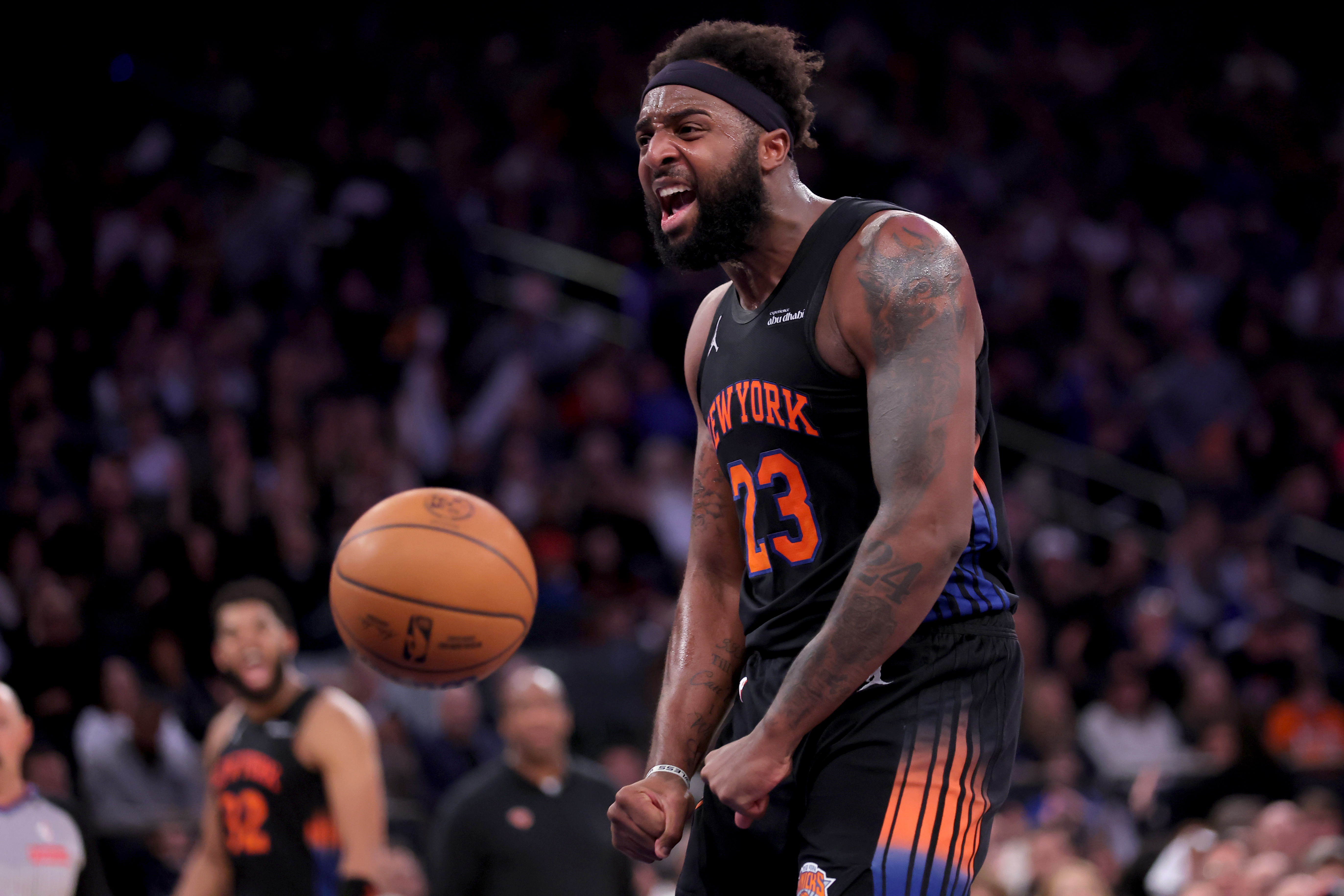 New York Knicks center Mitchell Robinson (23) reacts as we break down our NBA Christmas Day parlay picks and predictions.