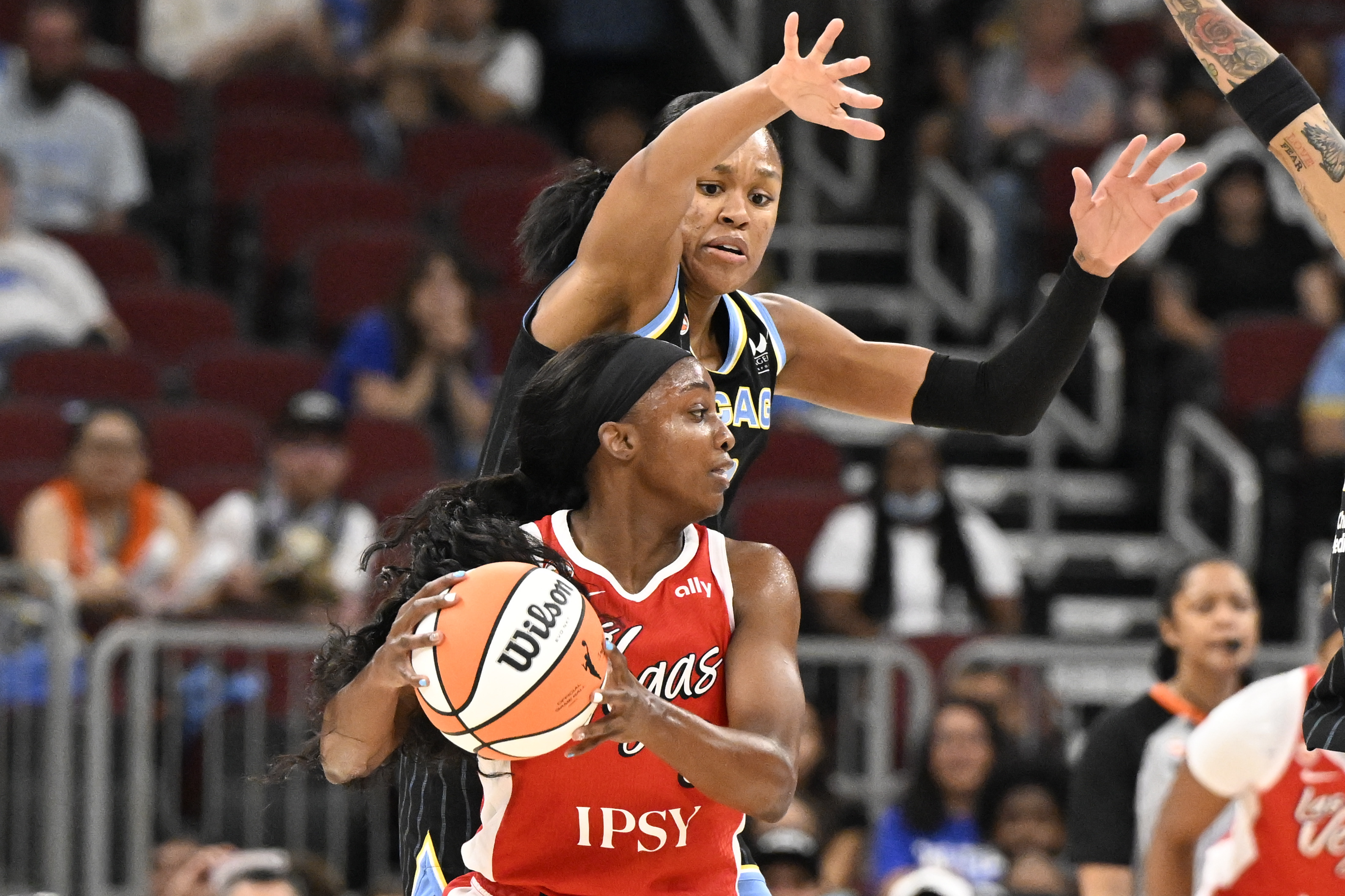 Chicago Sky forward Azura Stevens (30) defends Las Vegas Aces guard Jackie Young (0) as we break down our Sky vs. Aces prediction.