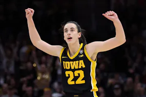 Caitlin Clark of the Iowa Hawkeyes reacts in the second half as we look at the Iowa sports betting financials for April 2024.