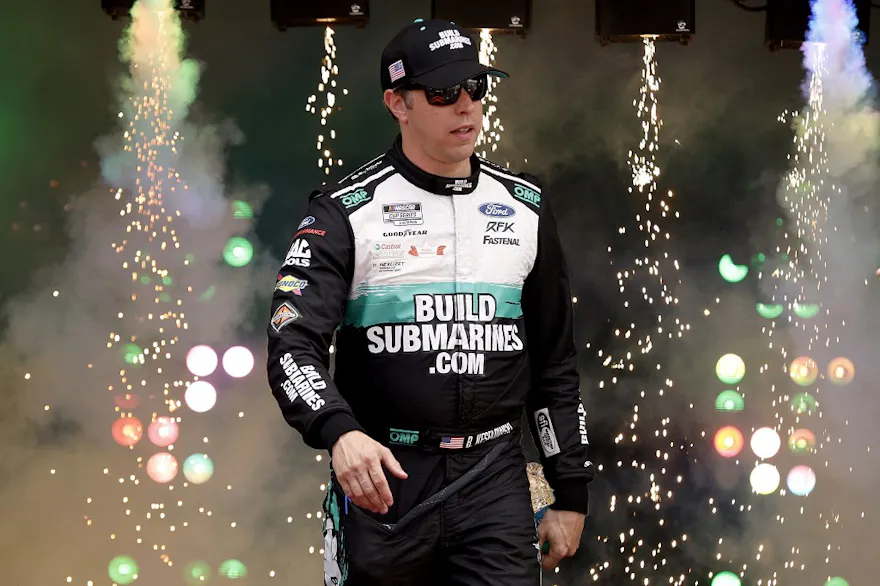 Brad Keselowski walks onstage during driver intros prior to the NASCAR Cup Series Cook Out 400 at Richmond Raceway as we look at our Coke Zero Sugar 400 picks.