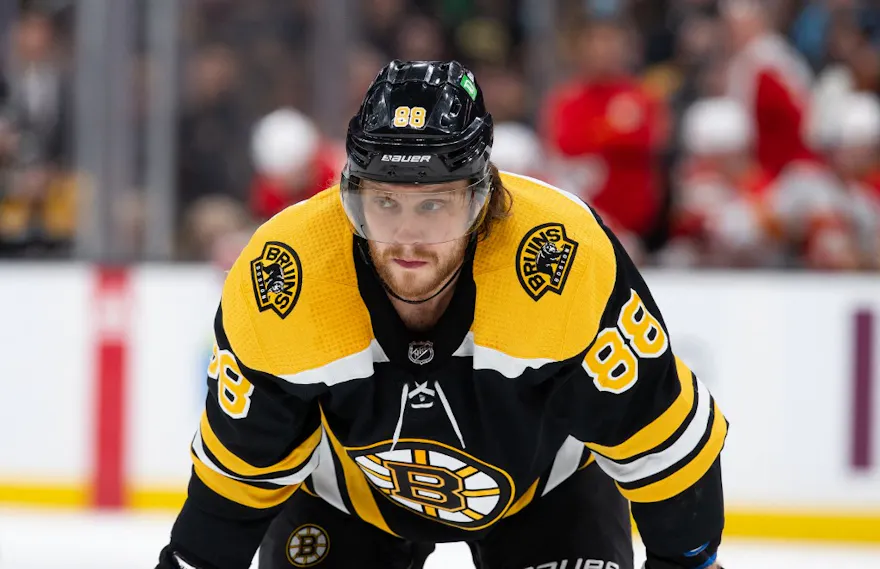 David Pastrnak #88 of the Boston Bruins skates during the second period as we look at Massachusetts' record setting sports betting financials for December 2023.