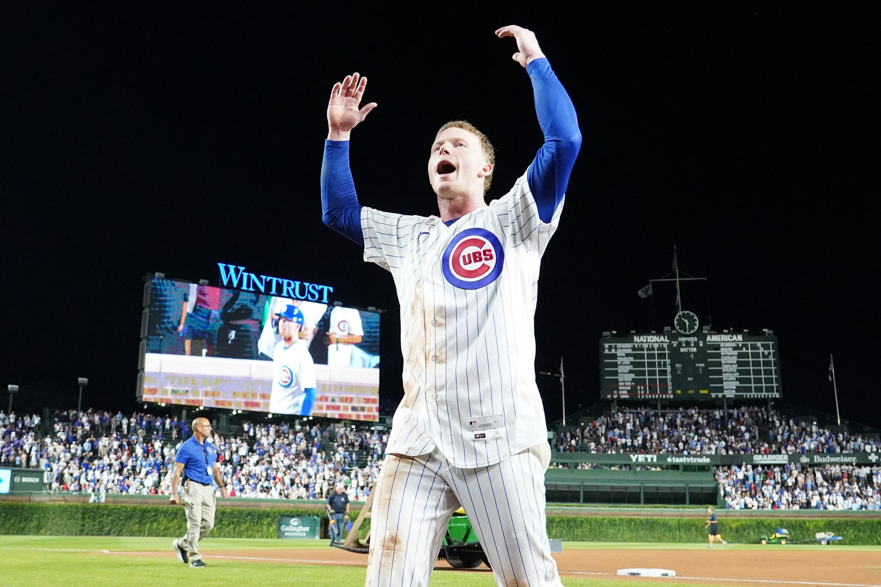 Chicago Cubs center fielder Pete Crow-Armstrong (4) gestures to the fans as he is featured in our White Sox vs. Cubs win probability.