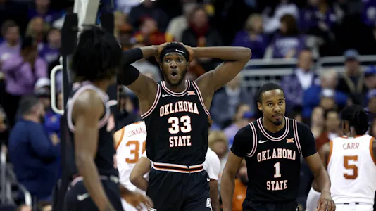 Moussa Cisse of the Oklahoma State Cowboys reacts to a foul during the Big 12 Tournament game and we look at our top odds and predictions for the NIT game between North Texas and Oklahoma State.