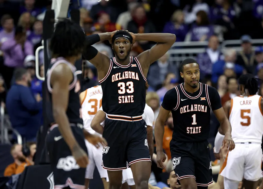 Moussa Cisse of the Oklahoma State Cowboys reacts to a foul during the Big 12 Tournament game and we look at our top odds and predictions for the NIT game between North Texas and Oklahoma State.