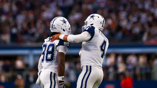 Dallas Cowboys wide receiver Ceedee Lamb (88) celebrates with Dallas Cowboys quarterback Dak Prescott (4) as we offer our NFL AI predictions for Week 9.