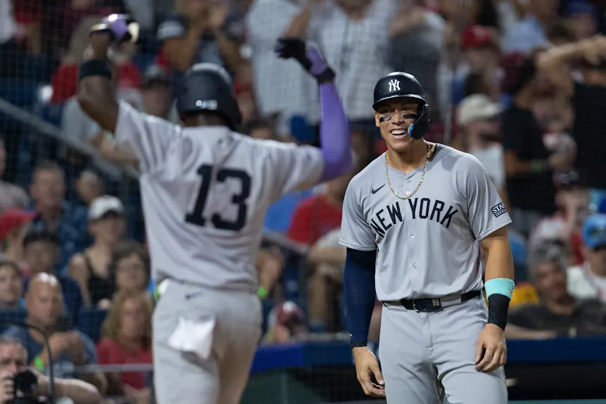 New York Yankees third base Jazz Chisholm Jr. celebrates with outfielder Aaron Judge as we look at the our best Blue Jays vs. Yankees player props.