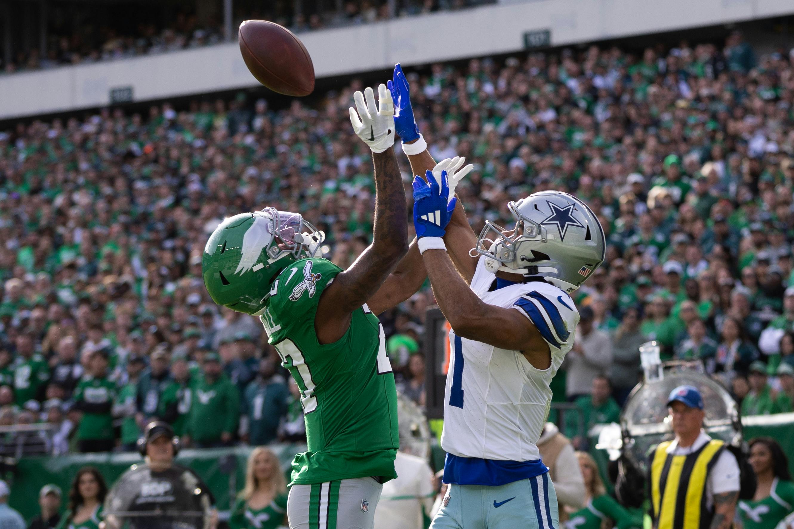 Dallas Cowboys wide receiver Jalen Tolbert is contested by Philadelphia Eagles cornerback Quinyon Mitchell as we break down the 2024-25 Defensive Rookie of the Year odds. 