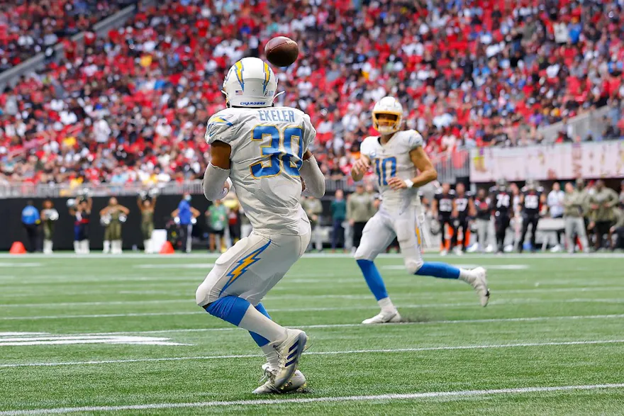 Austin Ekeler of the Los Angeles Chargers scores a touchdown against the Atlanta Falcons at Mercedes-Benz Stadium on Nov. 06, 2022 in Atlanta, Georgia.