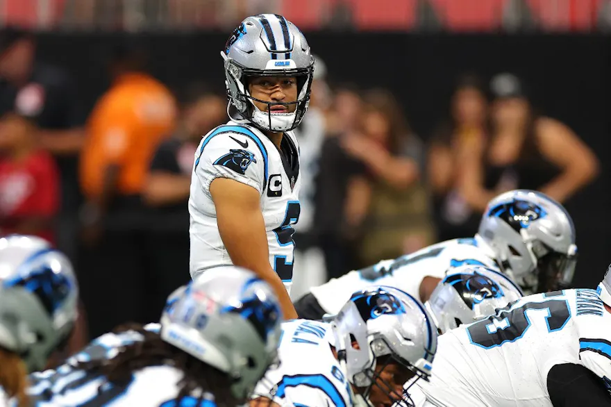 Bryce Young of the Carolina Panthers calls a play before his game against the Atlanta Falcons, and we offer our top Bryce Young player props for the Monday Night Football game between the Saints and Panthers based on the best NFL odds.