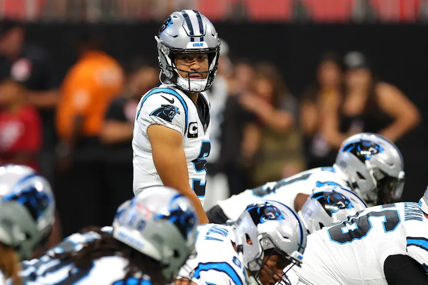 Bryce Young of the Carolina Panthers calls a play before his game against the Atlanta Falcons, and we offer our top Bryce Young player props for the Monday Night Football game between the Saints and Panthers based on the best NFL odds.