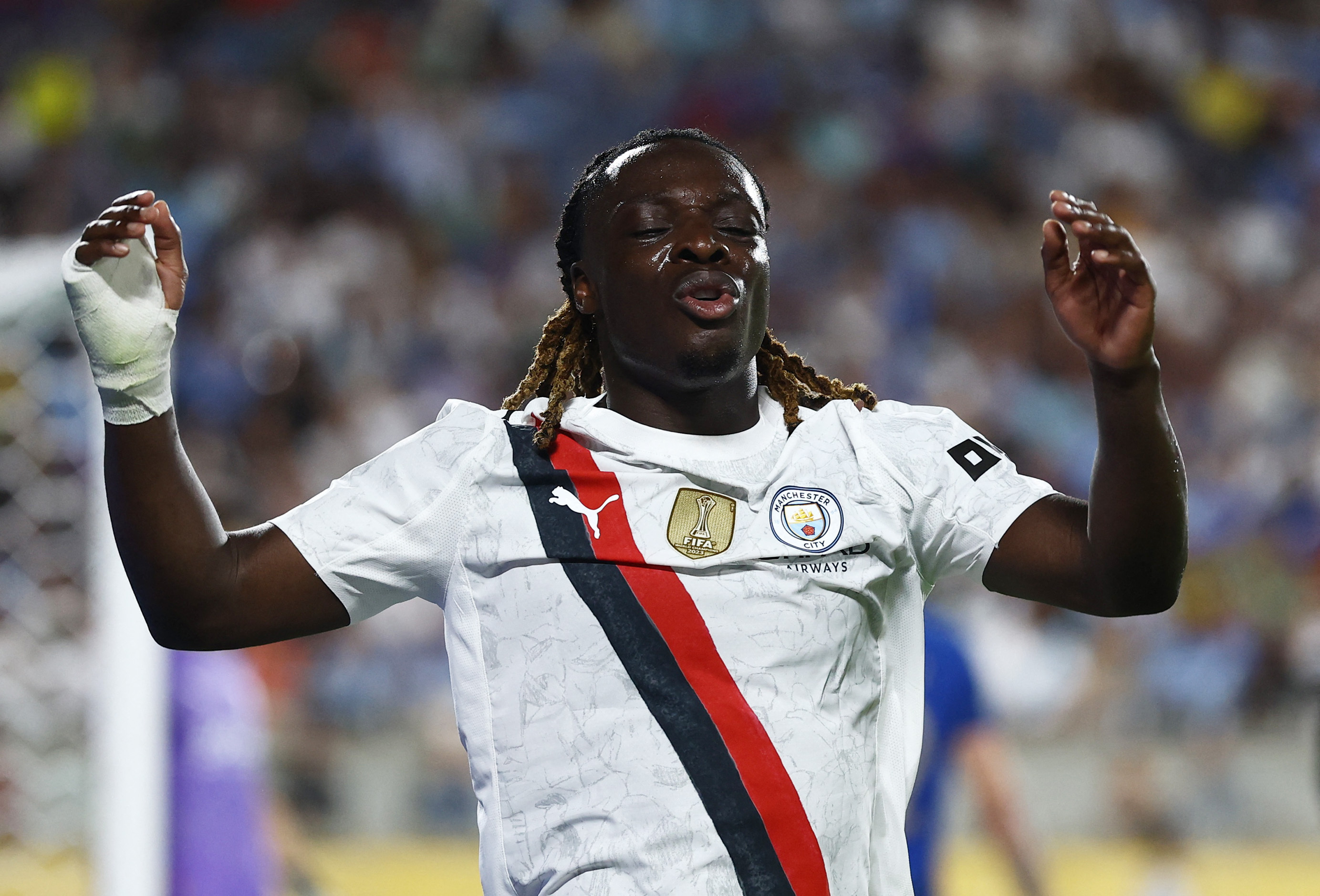 Manchester City midfielder Jeremy Doku reacts as we make our best Newcastle vs. Manchester City prediction.