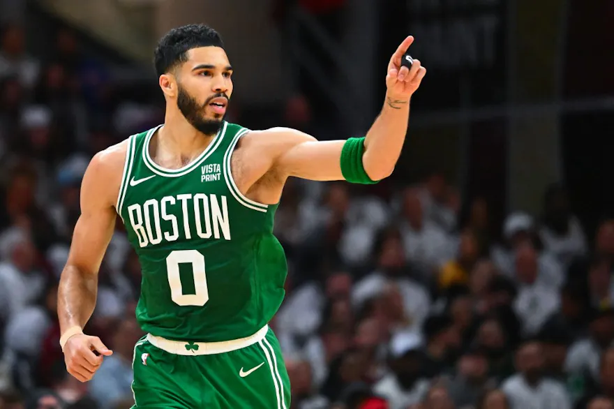 Jayson Tatum #0 of the Boston Celtics reacts after scoring a basket as we look at the NBA championship odds