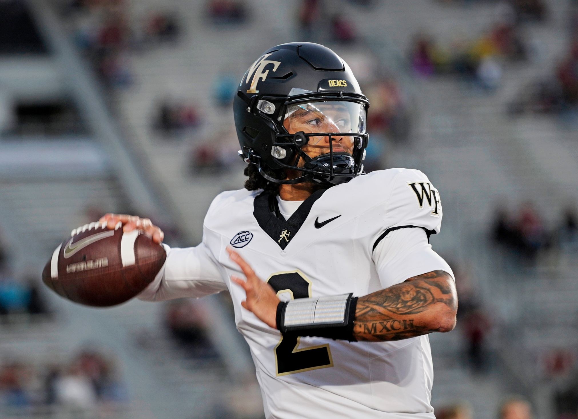 Wake Forest Demon Deacons quarterback Robby Ashford throws a pass as we look at our Wake Forest vs. Mississippi State anytime touchdown scorer predictions