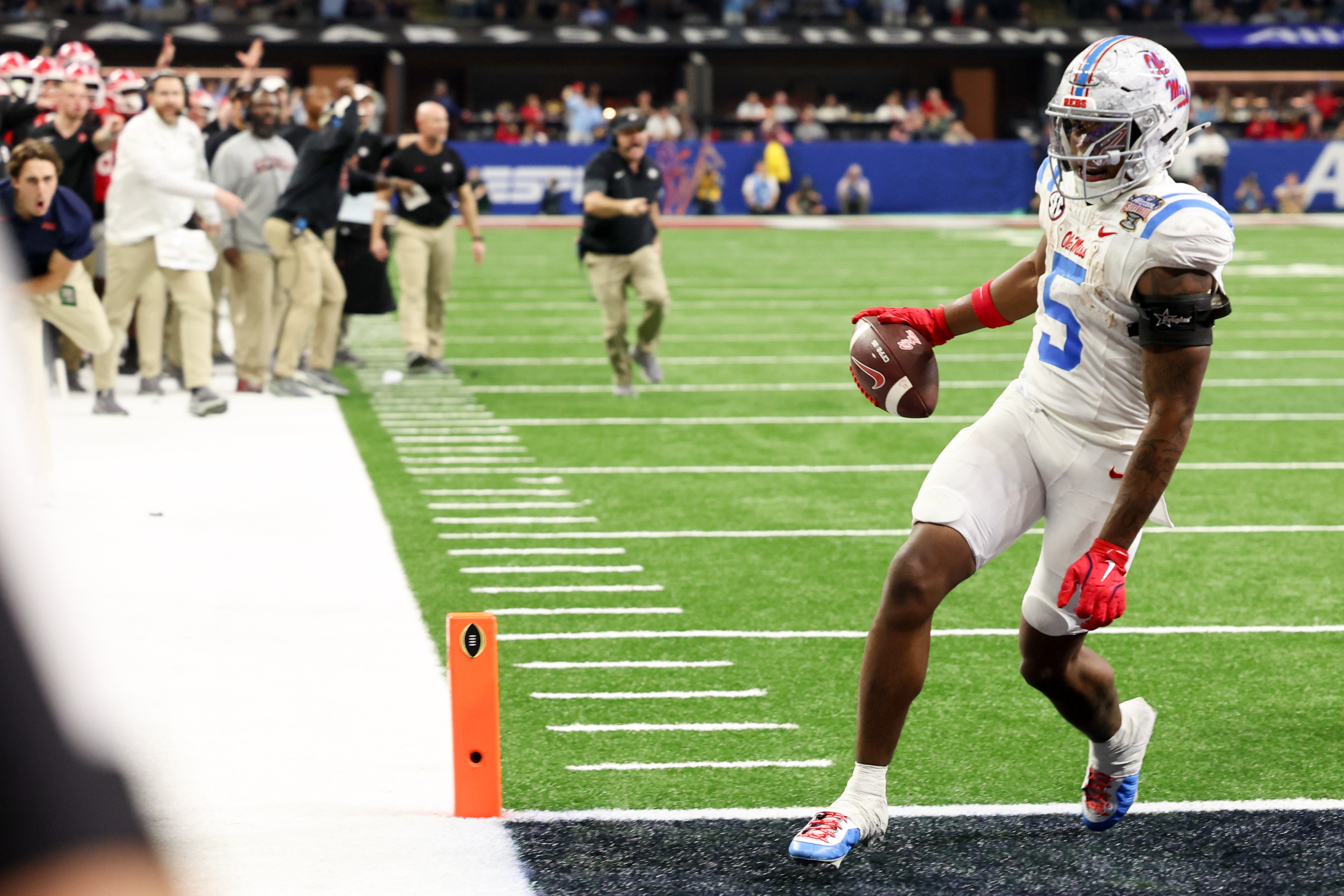 Mississippi Rebels running back Kewan Lacy (5) scores a touchdown as we break down our Miami vs. Ole Miss expert picks for the Fiesta Bowl.