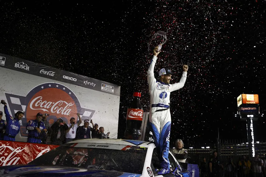 Kyle Larson celebrates in victory lane after winning the NASCAR Cup Series Coca-Cola 600 at Charlotte Motor Speedway, as we preview the 2024 Coca-Cola 600 on Sunday.