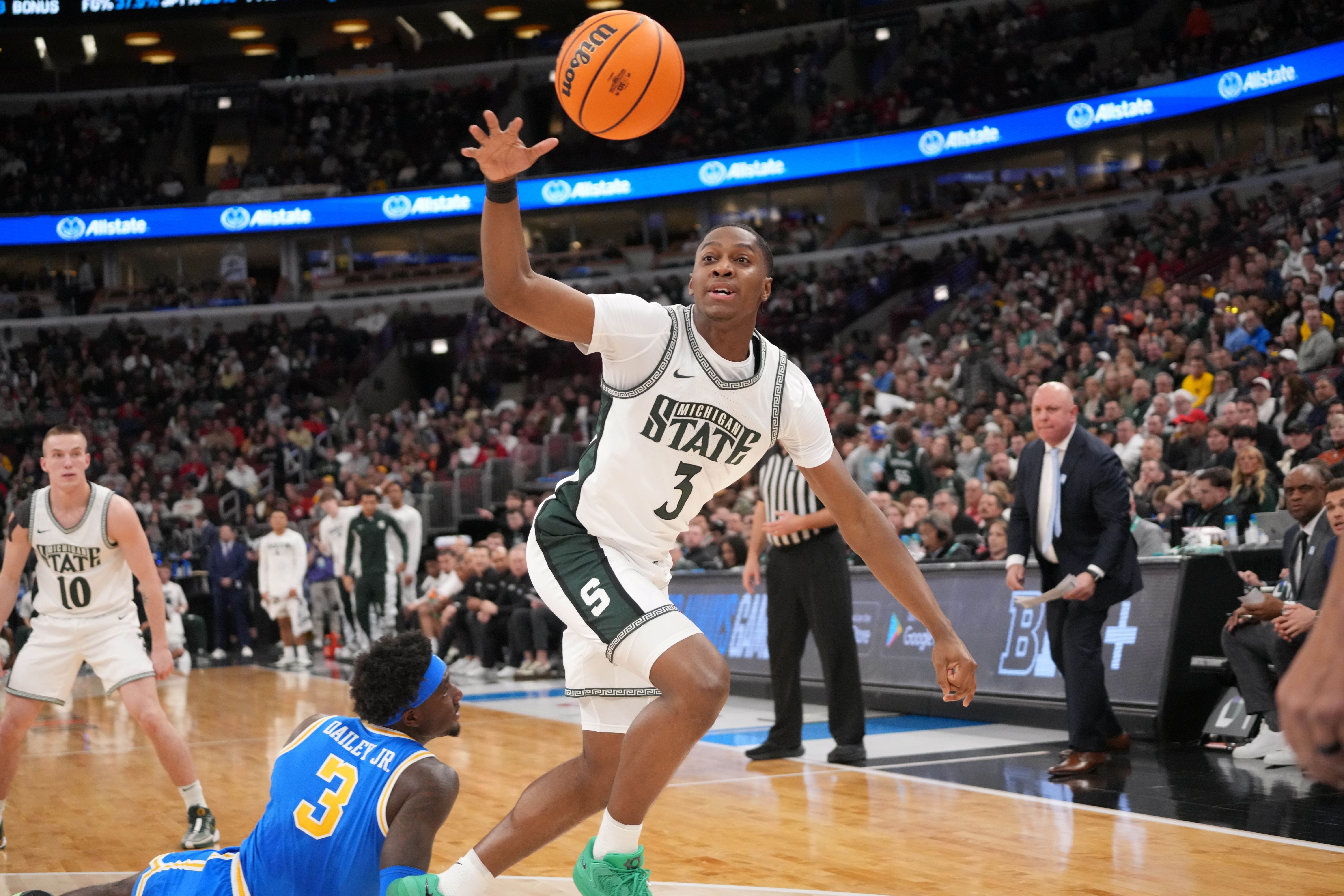 Michigan State Spartans forward Cameron goes for a loose ball as we make our best North Dakota State vs. Michigan State prediction & parlay