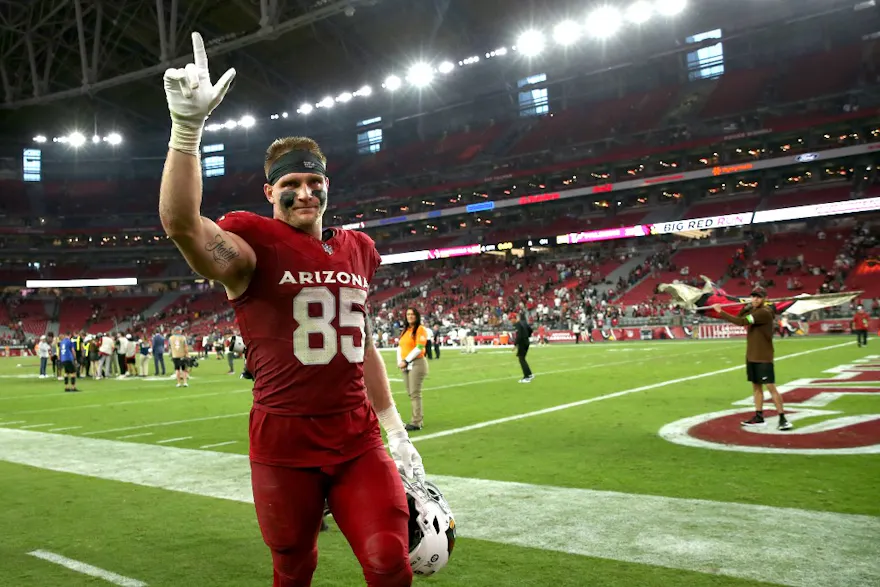 Trey McBride #85 of the Arizona Cardinals waves to the fans as we make our best NFL Week 11 upset picks.