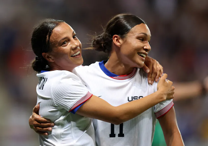Mallory Swanson celebrates scoring a goal with Sophia Smith against Zambia as we offer our best picks and predictions for the final Group B featuring the USA and Australia.