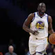 Draymond Green of the Golden State Warriors dribbles the ball against the Washington Wizards as we look at our Warriors-Knicks promo code for bet365.