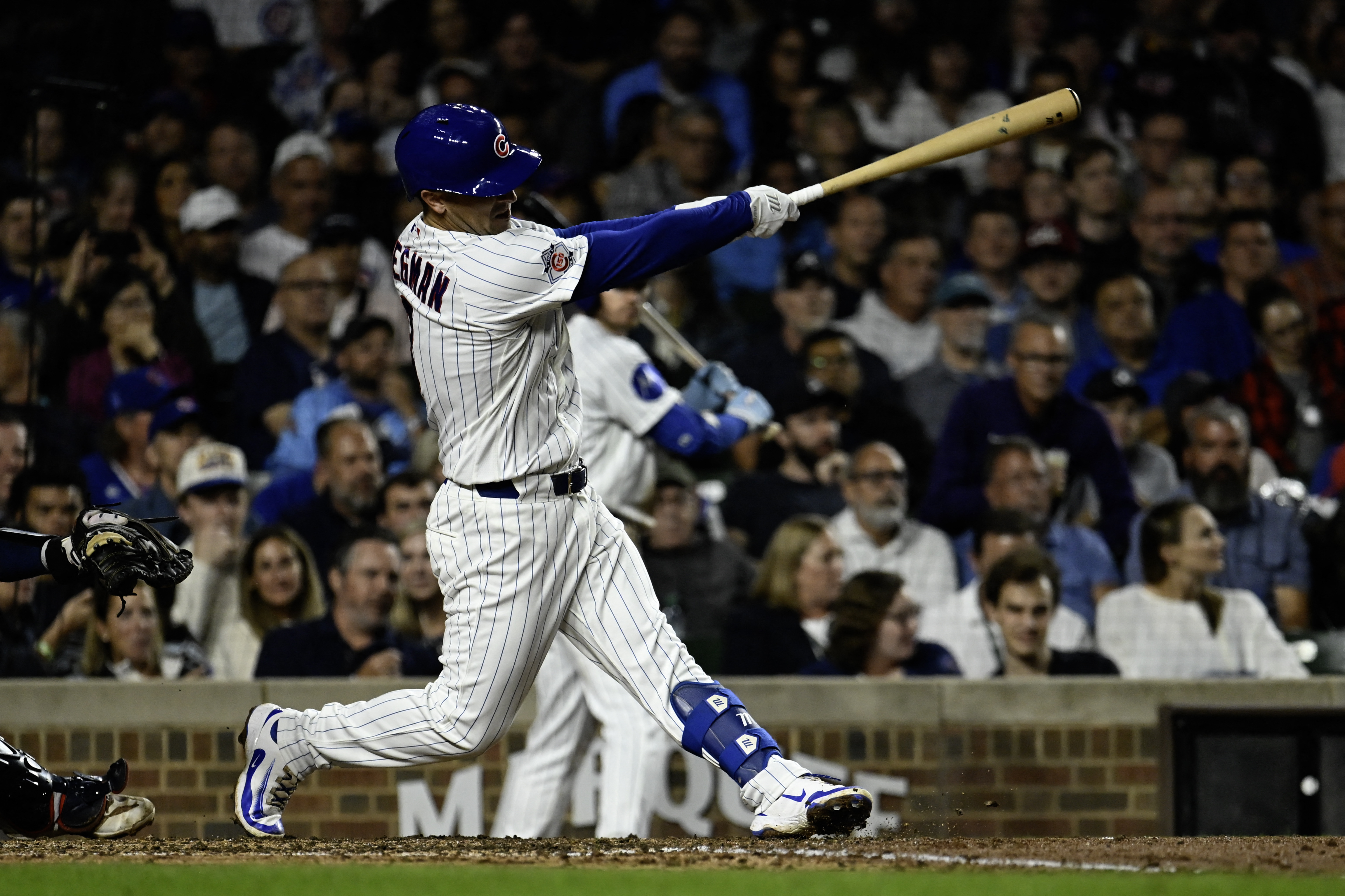 Chicago Cubs third baseman Alex Bregman (3) hits a two RBI triple as he is featured in our MLB best home run predictions.