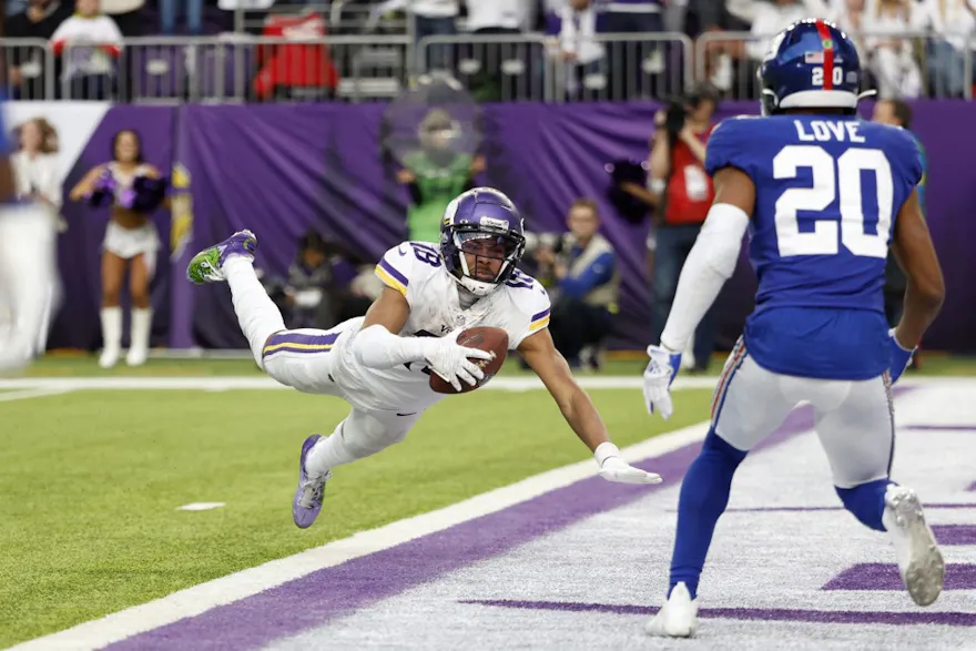 Justin Jefferson of the Minnesota Vikings catches a touchdown pass against the New York Giants at U.S. Bank Stadium on Dec. 24, 2022 in Minneapolis, Minnesota.