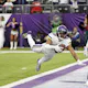 Justin Jefferson of the Minnesota Vikings catches a touchdown pass against the New York Giants at U.S. Bank Stadium on Dec. 24, 2022 in Minneapolis, Minnesota.