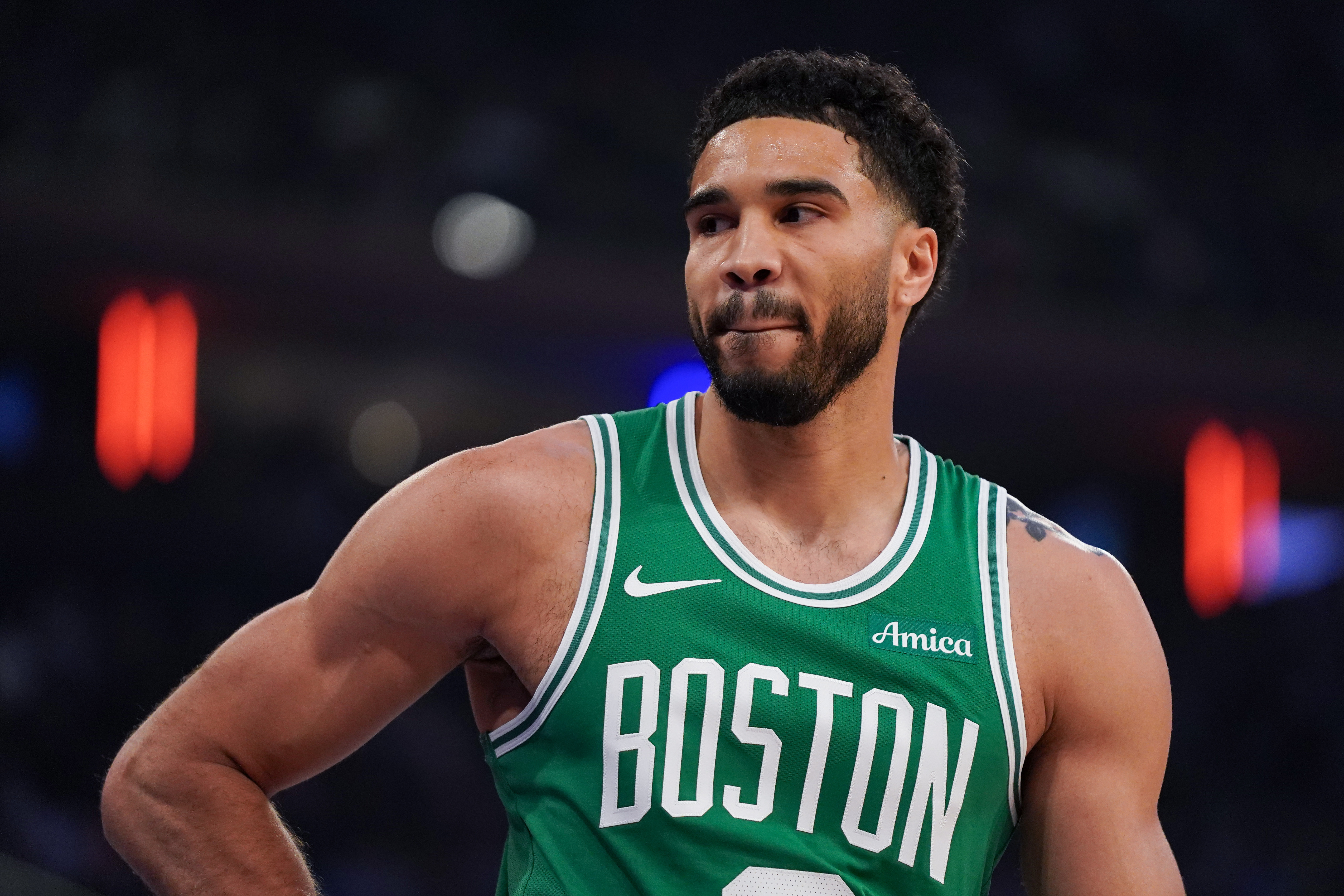 Boston Celtics forward Jayson Tatum (0) looks on as he is featured in our 76ers vs. Celtics player props.
