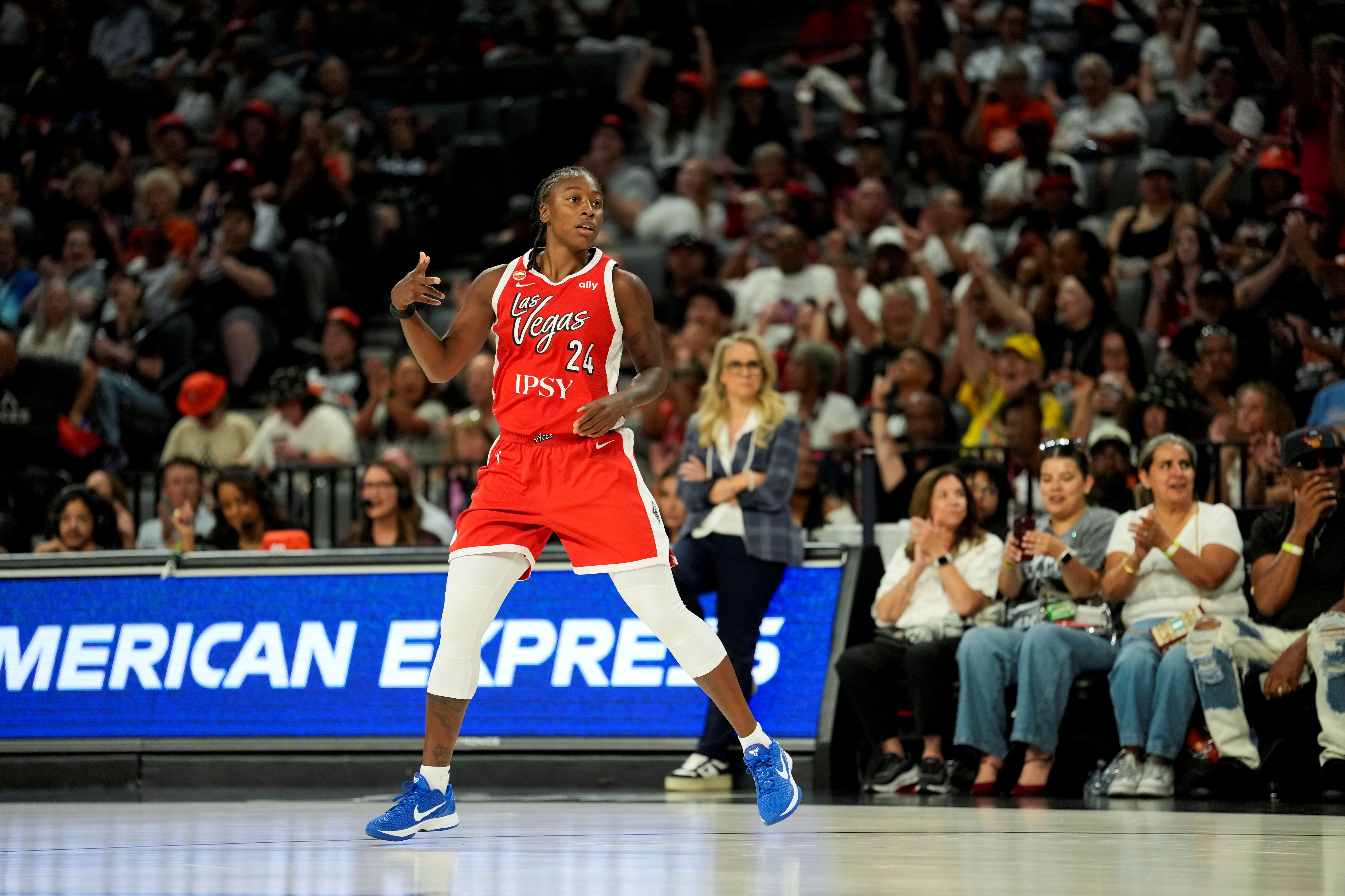 Las Vegas Aces guard Jewell Loyd reacts after scoring as we make our best Aces vs. Tempo prediction.