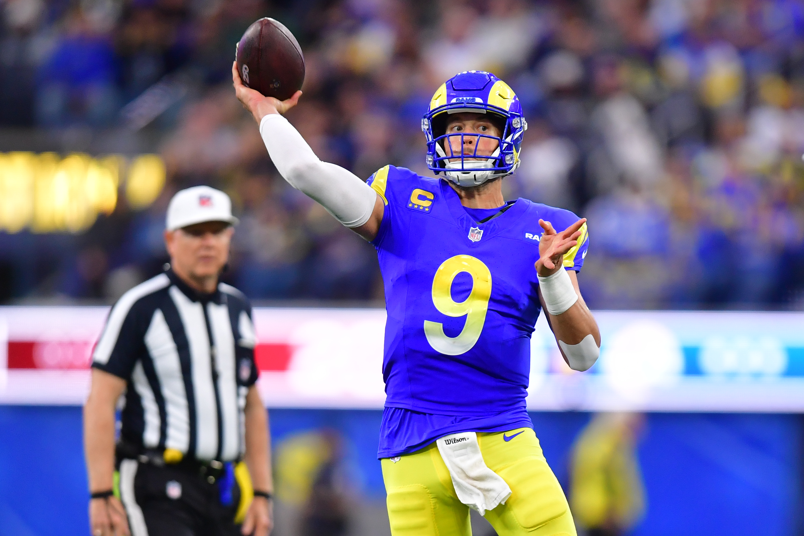 Los Angeles Rams quarterback Matthew Stafford (9) throws downfield as we look at the NFL MVP odds