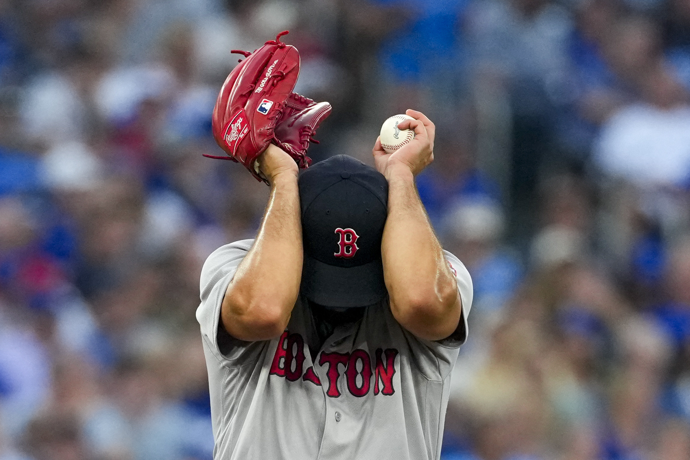 Boston Red Sox pitcher Patrick Sandoval covers his head as we make our best Giants vs. Red Sox prediction.
