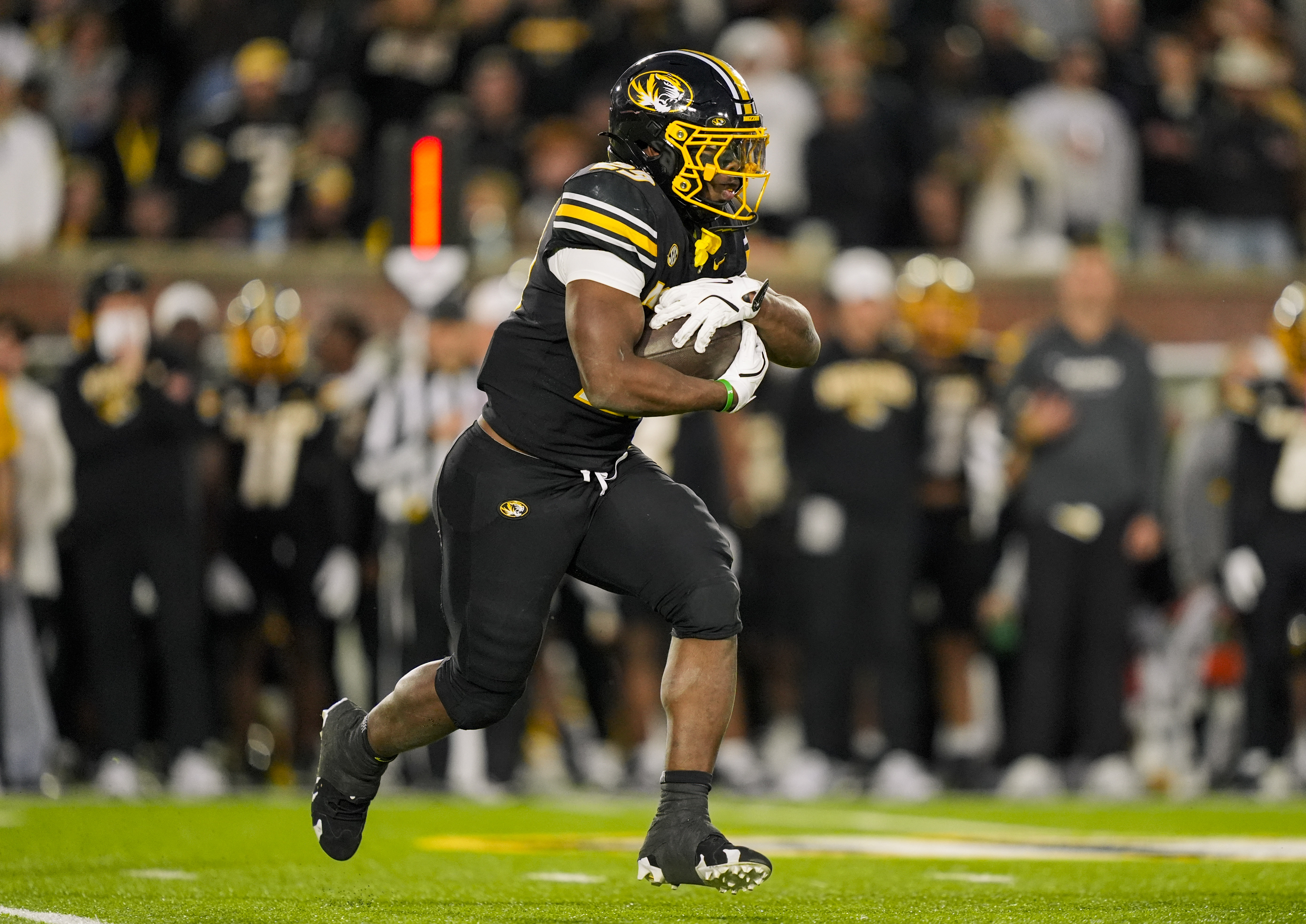 Missouri Tigers running back Ahmad Hardy (29) runs the ball as he is featured in our College Football Predictions this Week.
