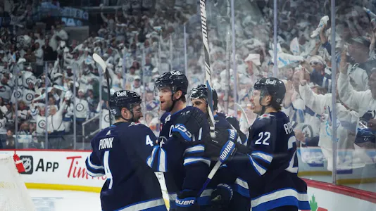 The Winnipeg Jets' Adam Lowry celebrates his second period goal in Game 1 as we offer our expert prop picks and predictions for Game 2 of the Colorado Avalanche vs. Winnipeg Jets first round series. 